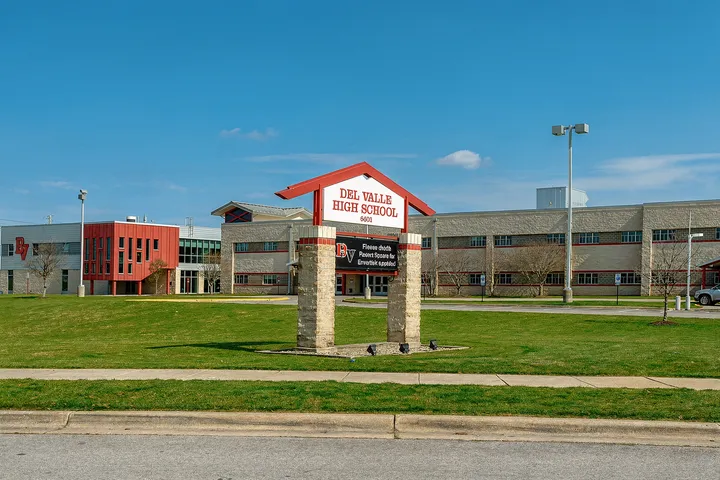 Suburban school campus environment in 78617 Del Valle, TX