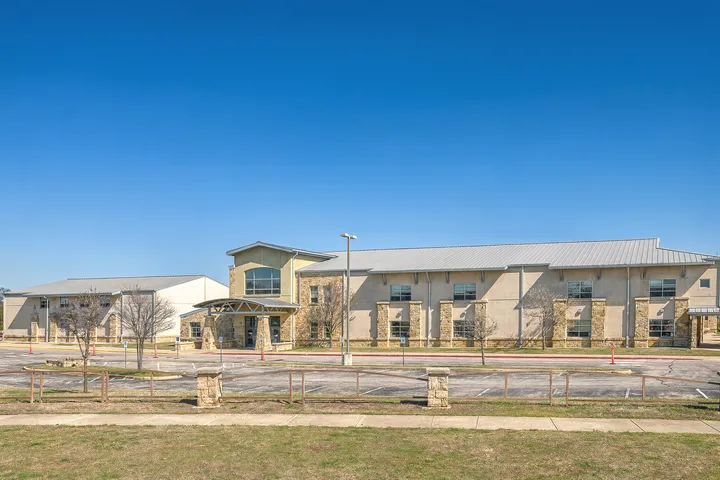 Suburban school campus environment in 78737 Austin area